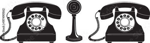 Vintage rotary telephones with a classic stand and handset