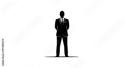 Silhouette of a businessman in a suit standing against a white background