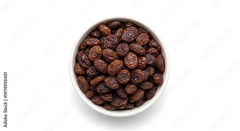 Fototapeta premium A bowl of dried raisins on a white background.