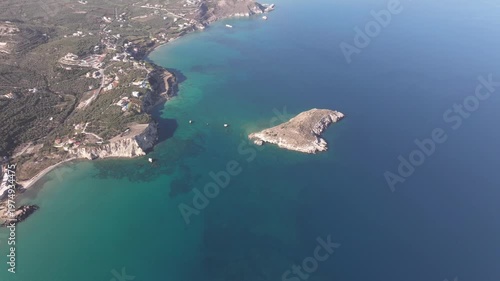 Aerial drone shot.View of famous beach in the summer, Crete, Greece. Famous beach with river and palm trees in Libyan sea. Tropical island, Panoramic view, Most beautiful beaches of Crete island