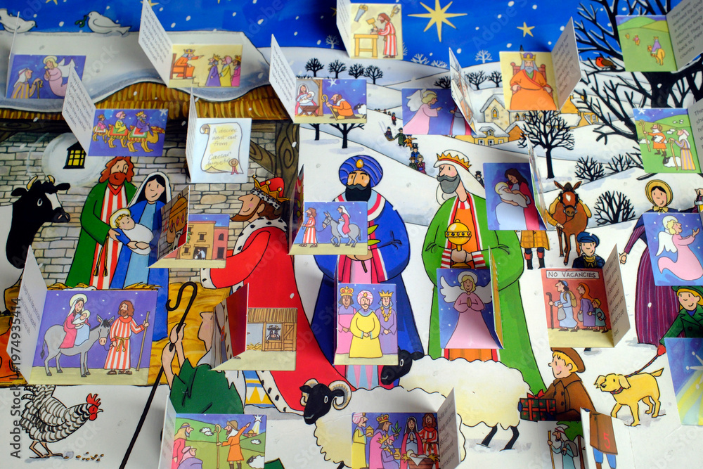 Fototapeta premium Complete opened pop-up nativity storybook with Three Kings, shepherds, angels, and stable scene displayed.