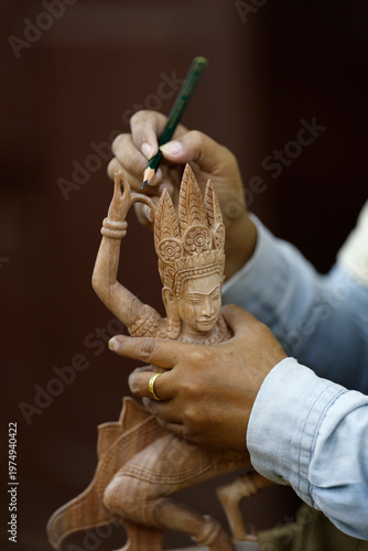 Artisans Angkor is a  social business  with the aim of providing employment  for rural youth while preserving traditional Khmer craftsmanship.  Wood carving.   Siem Reap. Cambodia.