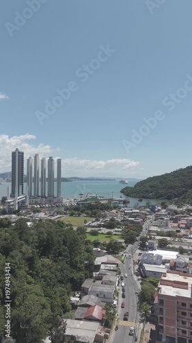 Beach, Ocean and City Skyline Surrounded by Nature