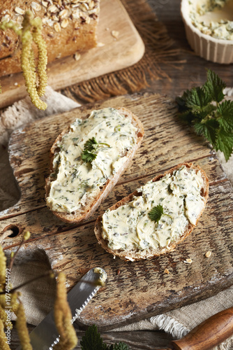 Nettle butter - homemade spread on slices of bread