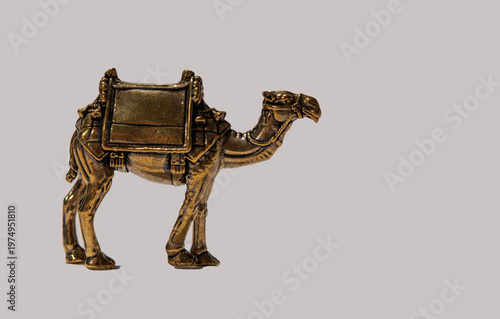 Egyptian figurine of a camel on an isolated background