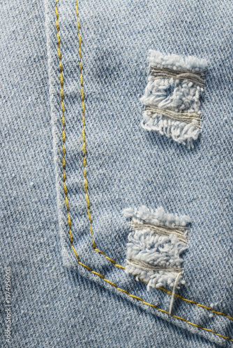 Detailed view of woven jeans material for fashion industry use.