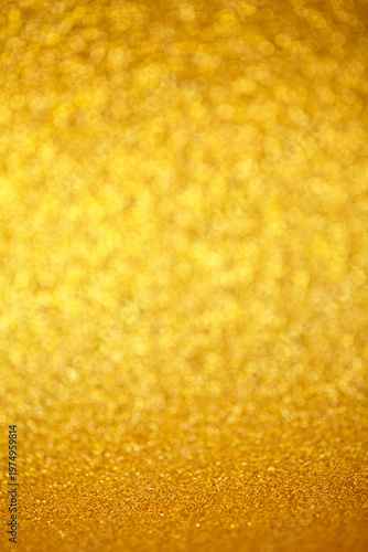 Luxurious Shimmering Background. Elegant Gold Sparkling Scenery. Warm Radiant Glow For Premium Imagery. Rich Shimmering Gold Bokeh Ideal For Luxurious Advertising And Holiday Displays
