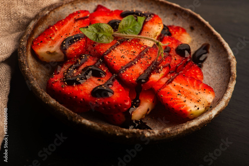 Savory Strawberries with Balsamic Cream and Black Pepper on Handmade Ceramic Plate