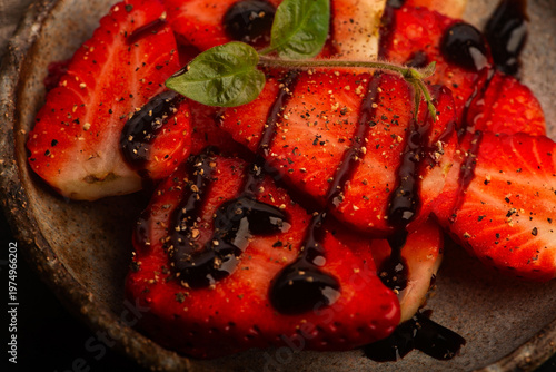 Savory Strawberries with Balsamic Cream and Black Pepper on Handmade Ceramic Plate