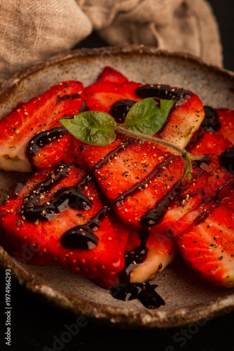 Savory Strawberries with Balsamic Cream and Black Pepper on Handmade Ceramic Plate