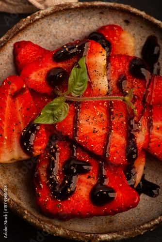 Savory Strawberries with Balsamic Cream and Black Pepper on Handmade Ceramic Plate