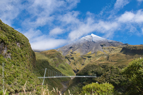 Hanging bridge in front of the Taranaki volcano in New Zealand