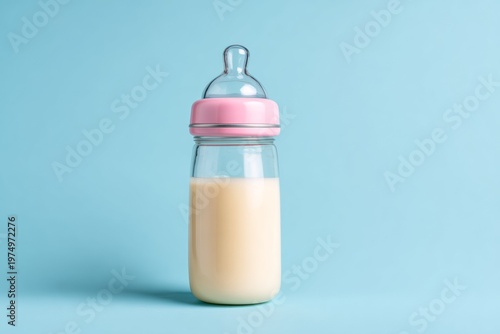 Minimalist Baby Bottle Filled With Milk Isolated on Smooth Pastel Background in High Resolution Setting