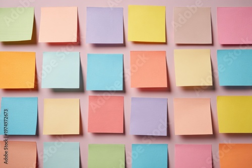 Sticky Notes Arranged Neatly in a Grid Format With Clear Space for Ideas and Thoughts in a Clean Workspace Environment