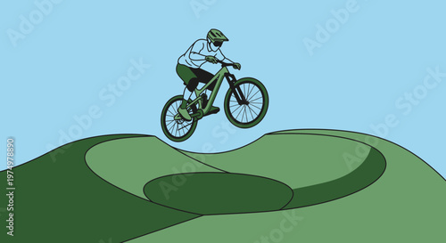 Dynamic Mountain Biker Soaring Over Green Terrain In Mid-Air Jump