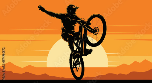 Dynamic Silhouette Of A Mountain Biker Performing A Wheelie At Sunset