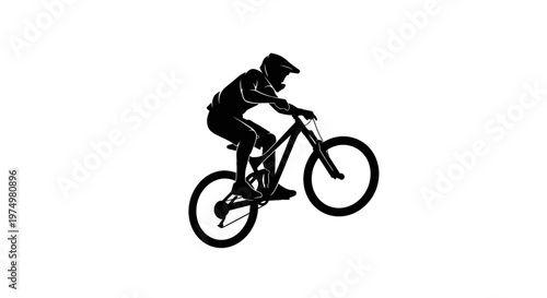 Dynamic Silhouette Of A Mountain Biker Performing An Aerial Trick