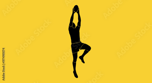 Dynamic Silhouette Of A Rugby Player In Mid-Air With Ball During A Game