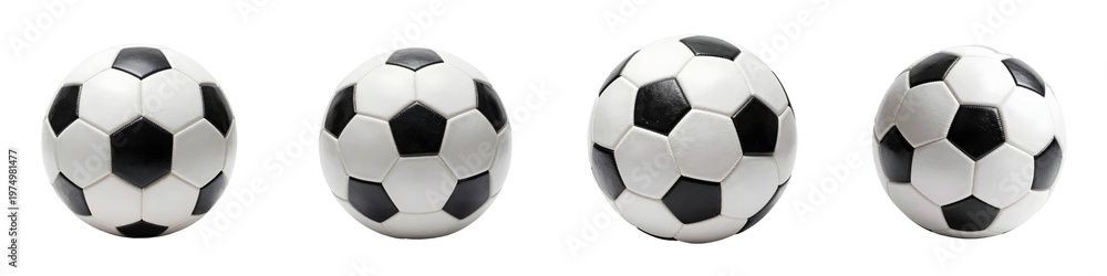 Fototapeta premium Soccer balls in a row isolated on solid black backdrop in studio setting