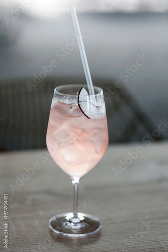 Pink Gin Cocktail with Ice and Lime
