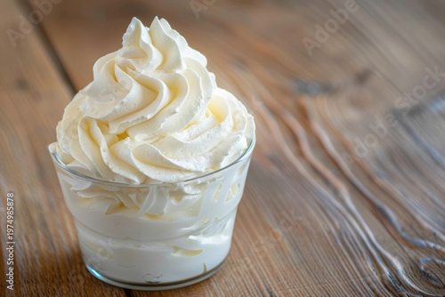 Glass with whipped cream close up, fluffy texture, dessert and lifestyle concept