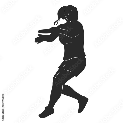 Silhouette of a woman throwing a frisbee
