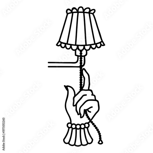 Hand turning on a lamp