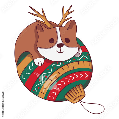 Cute corgi playing with a Christmas bulb