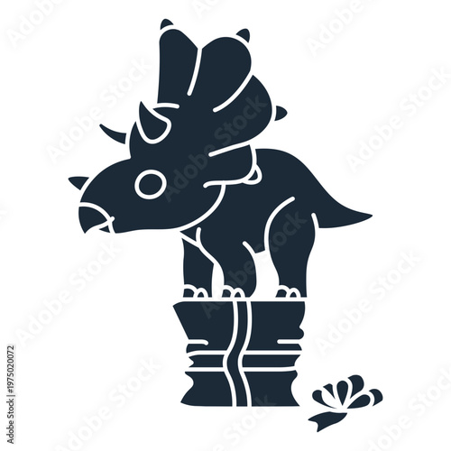 Cut-out silhouette of birthday dinosaur atop a gift box