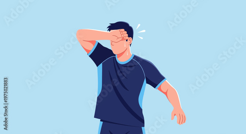 Frustrated Athlete Wipes Sweat From Brow During Intense Competition