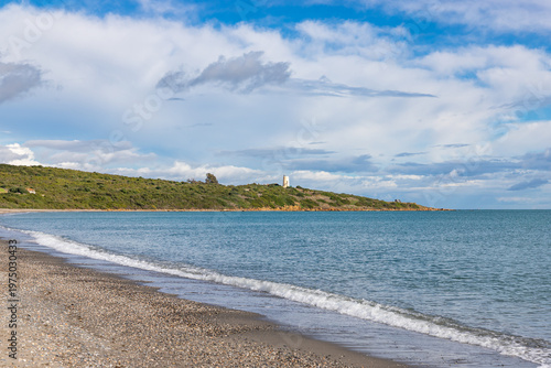 Coastal beach landscape with Carbonera lighthouse on Punta Mala, La Alcaidesa, Spain.