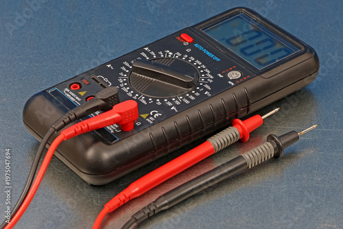 A digital multimeter for measuring the parameters of electrical circuits. Close-up. Soft focus.