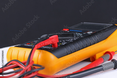 A digital multimeter for measuring the parameters of electrical circuits. Close-up. Soft focus.