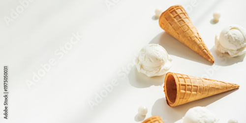Vanilla Ice Cream Cones with Scoops on White Table