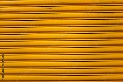 Metallic Door with yellow striped pattern