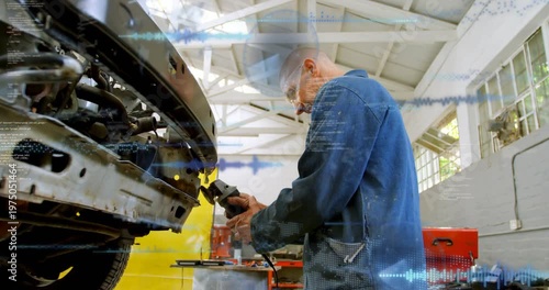 Mechanic aligning tool using grinder on bumper waveform overlay rising over scene for auto repair