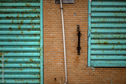 Wall with Traditional Tiles and Metal doors curtain