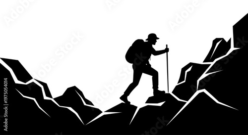 Man hiking on rocky mountain terrain.
