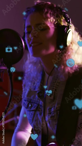 Vertical video: Camera focusing on hands and red guitar, musician playing and singing for vocals