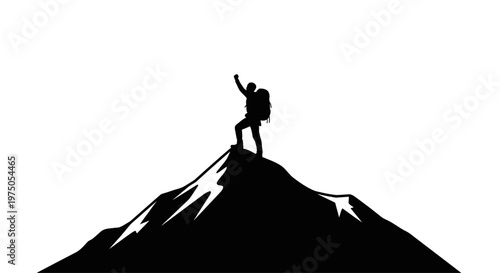 Man standing on mountain peak triumphantly.
