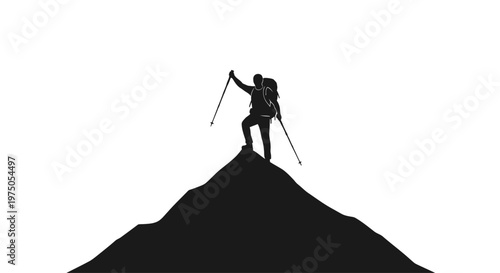 Hiker standing on mountain summit peak.