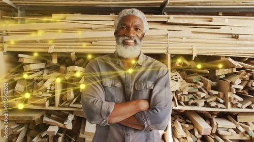 Senior carpenter facing camera yellow nodes and lines entering left sweeping to chest showing craft