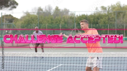 Orange tennis player shifting raising racket on ball seeking win under neon CHALLENGE ACCEPTED text