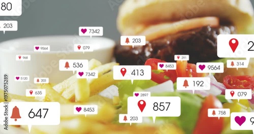 Multiplying badges spawning from 524 over studio plate, showing likes for sesame burger and fries