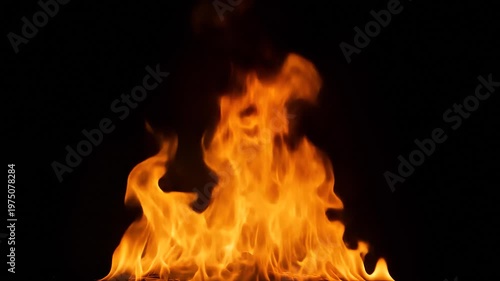 Realistic Fire Flame Isolated on Black Background. Tongues of bright fire. Burning Animation Overlay VFX Effect. 