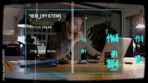 Vertical video: IT worker typing with pen, laptop starting cyan UI framing him checking sync rate