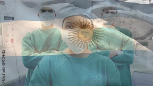 Animation of flag of argentina over diverse surgeons with face masks