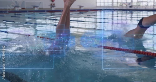 Lead swimmer pushing off on start signal, diving into water, blue overlay marking wake for swimming