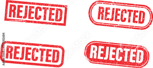 A set of red rubber stamps with the word REJECTED on transparent background
