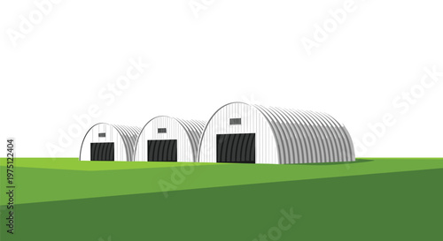 Three corrugated metal Quonset huts stand in a neat row upon a vibrant green grassy field under a bright clear white sky with sharp architectural lines.